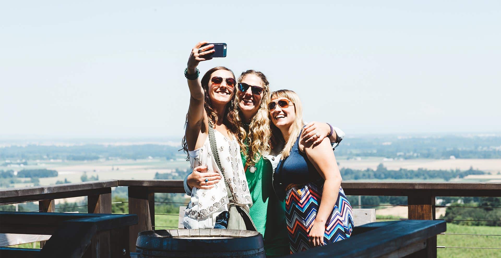 three young ladies taking a selfie