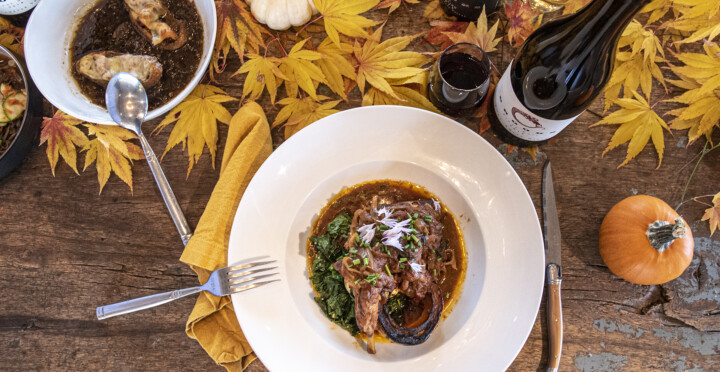 Braised rabbit with delicata squash, tomato & kale